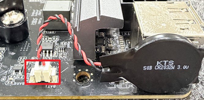 Locate the battery on the motherboard.